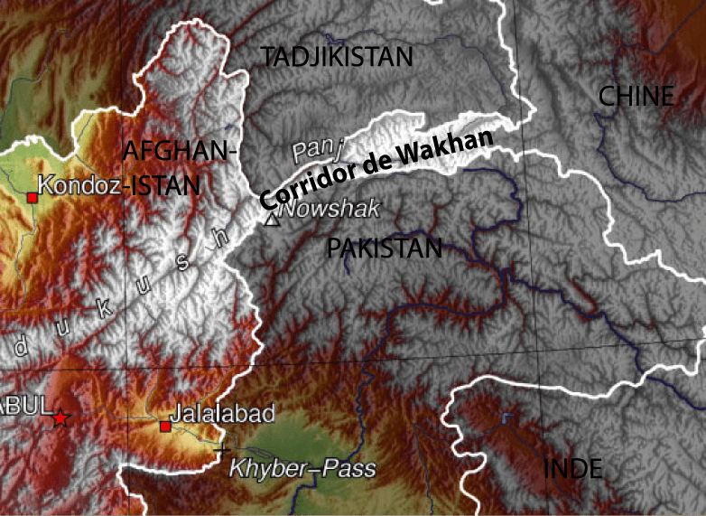 The wide Wakhan valley with a river glittering between grassy banks and snowy peaks